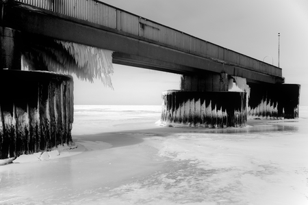 A frozen pier from a precarious vantage.